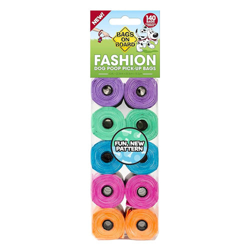 A pack of Bags on Board fashioned dog poo pick-up bags in various colors, including purple, green, orange, and blue, with a label stating 'NEW FASHION' and 'FUN NEW PATTERN'.
